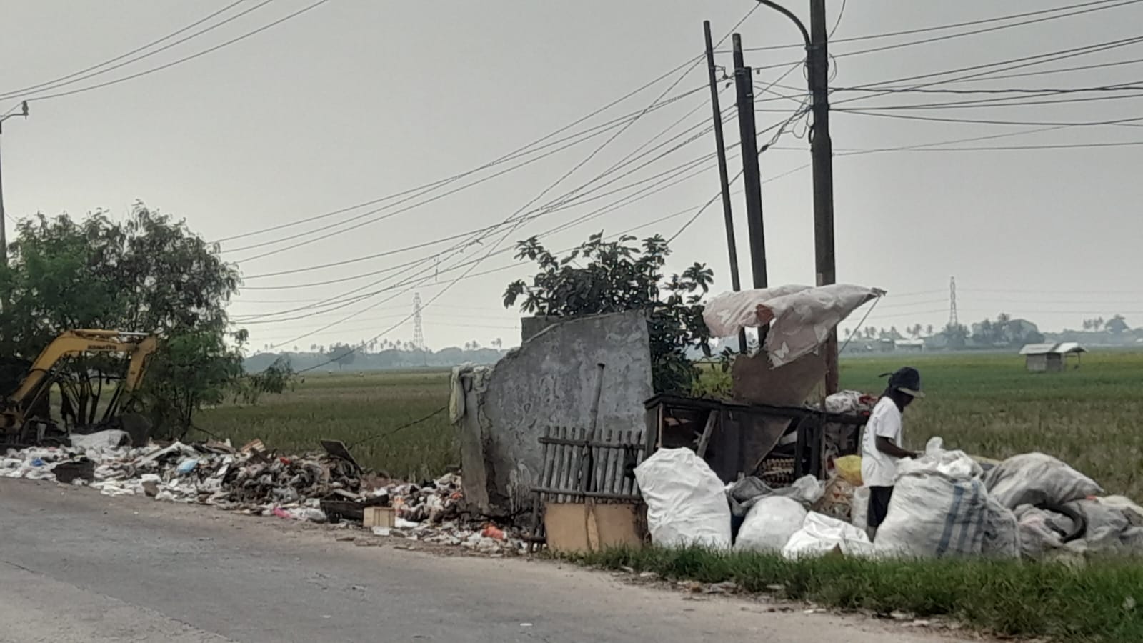 Kepala UPTD 8 DLHK Kabupaten Tangerang Tak Persoalkan TPS di Jalan Raya Mauk Dipindahkan