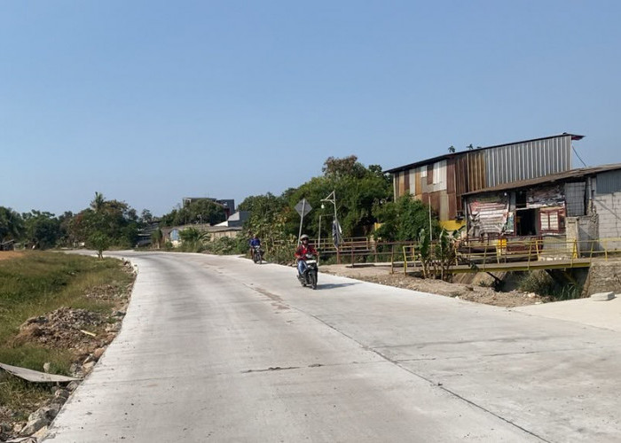 DBMSDA Respon Cepat Tangani Aduan, Jalan Teluk Jakarta Pasar Kemis Kembali Mulus